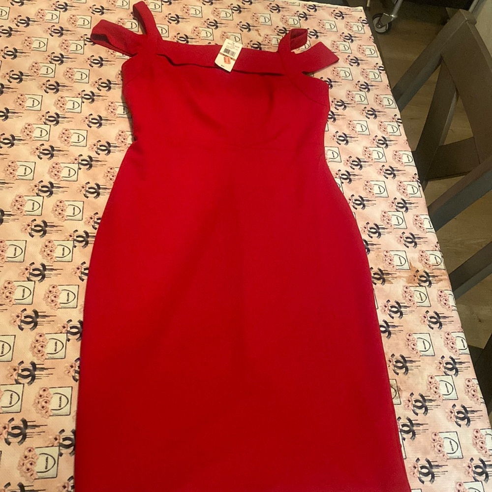 Nice red dress perfect for the summer time. Never worn!